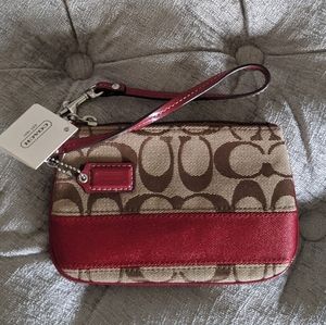 Coach brown and burgundy wristlet
